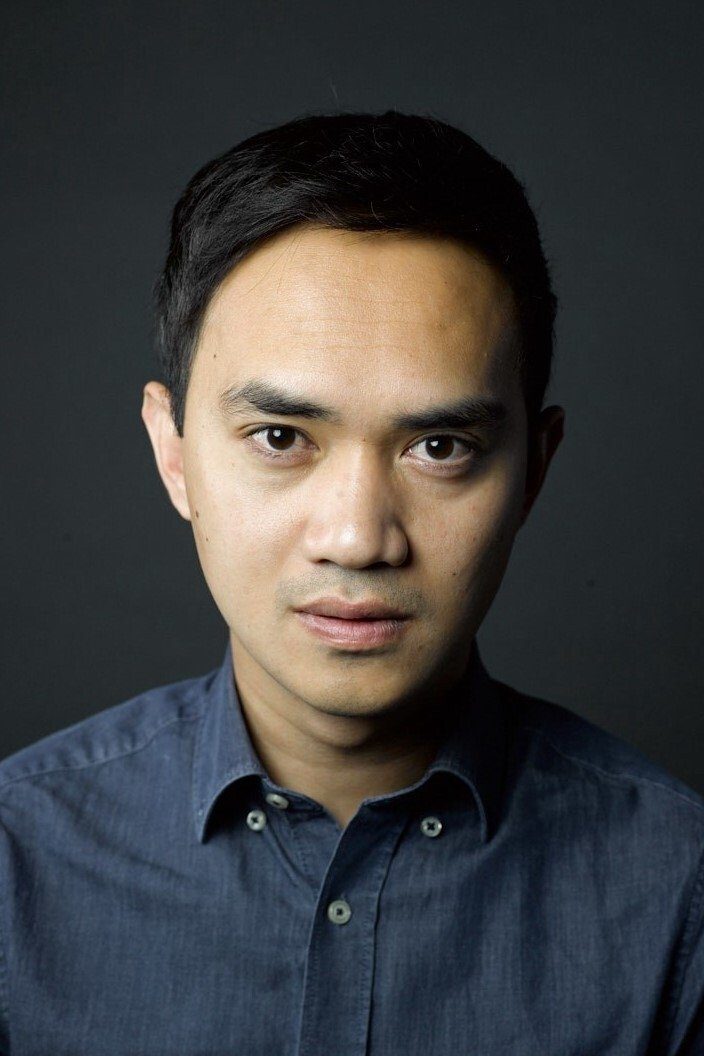Dramatic headshot: Zedrick with a serious, direct gaze against a dark backdrop